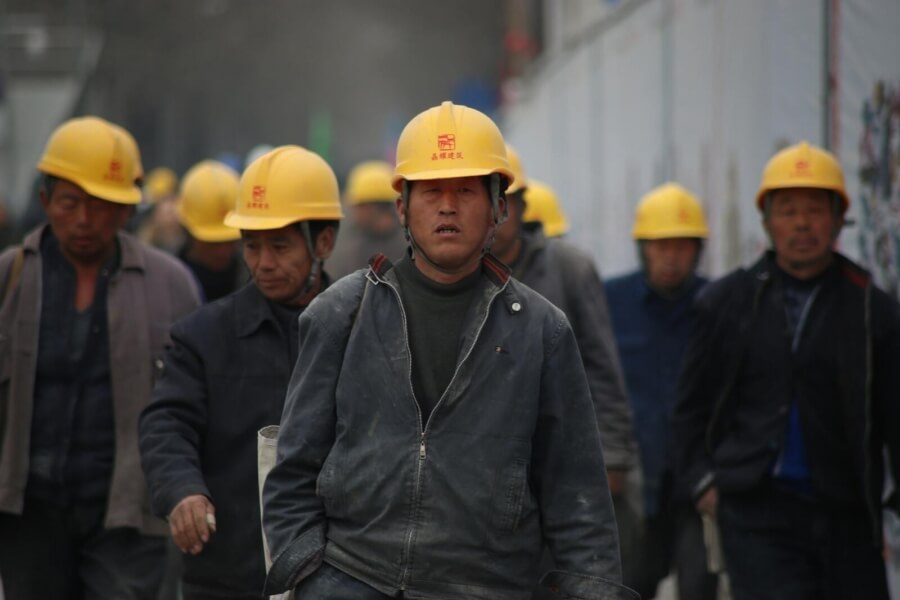 Chinesische Arbeiter aus einer Fabrik