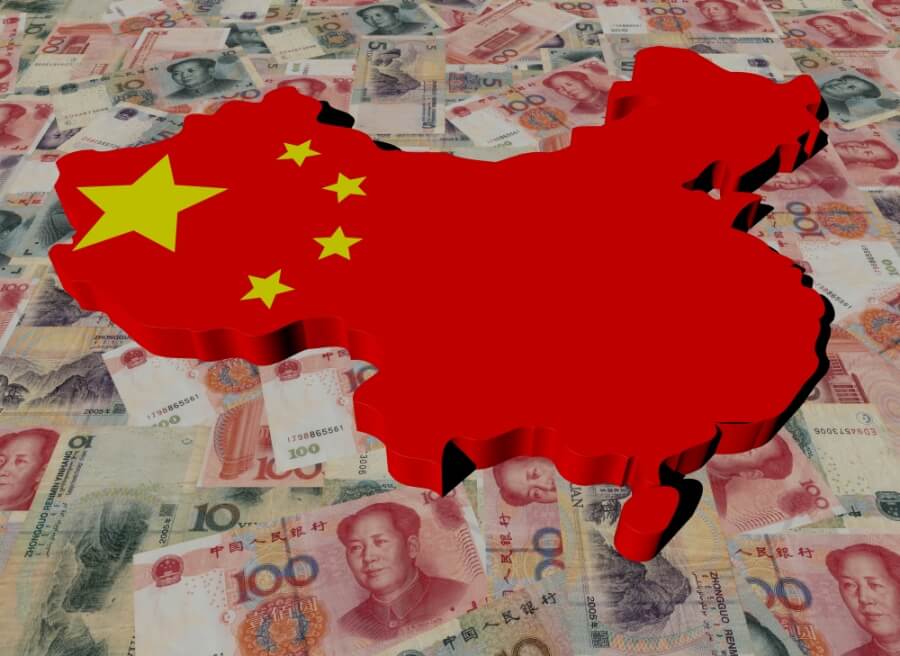 Umriss der chinesischen Landkarte, eingefärbt in rot mit gelben Sternen, liegt auf Yuan-Banknoten