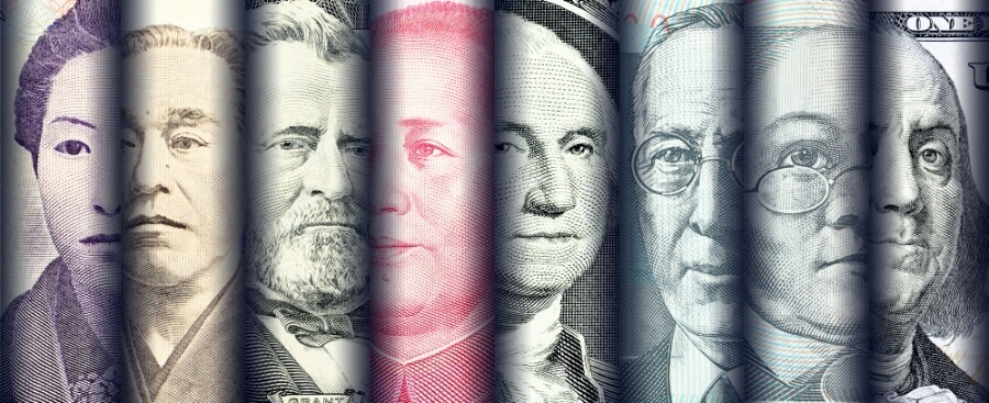 Banknoten verschiedener Länder mit Portraits nebeneinander