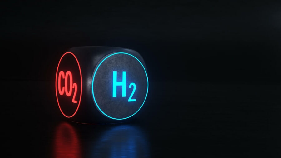 Ein Würfel mit den chemischen Abkürzungen H2 und CO2