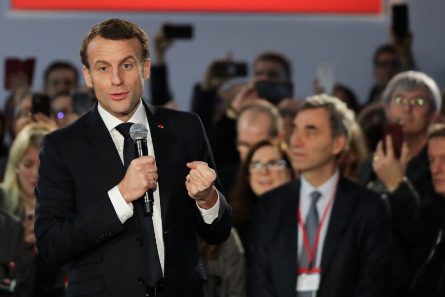 French President Emmanuel Macron gives a speech surrounded by empoyees at the SAFT groupe's (Société des Accumulateurs Fixes et de Traction) car batteries production plant in Nersac, near Angouleme, Western France, on January 30, 2020. .Photo by Thibaud Moritz/ABACAPRESS.COM