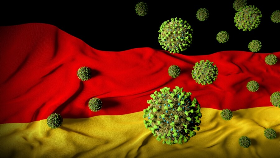 Symbolbild Deutschlandflagge und Corona-Viren