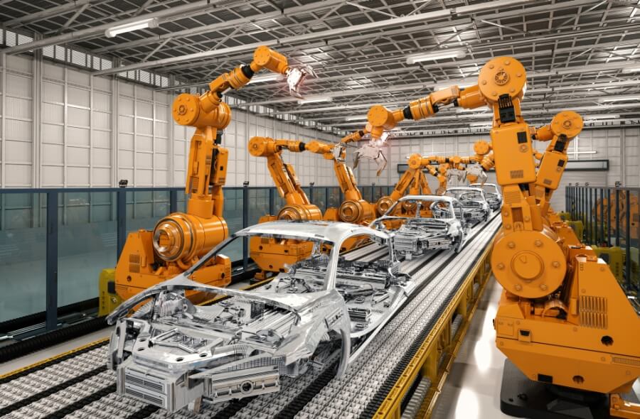 Roboter setzen in einer Fabrik Autokarosserien zusammen