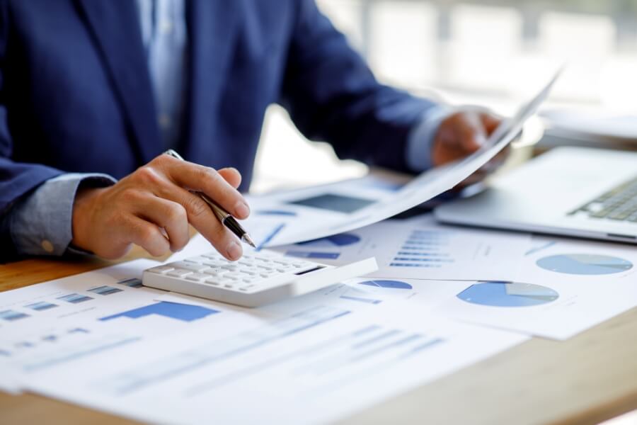 Businessman analyzing the financial report, business plan investment and  finance analysis concept