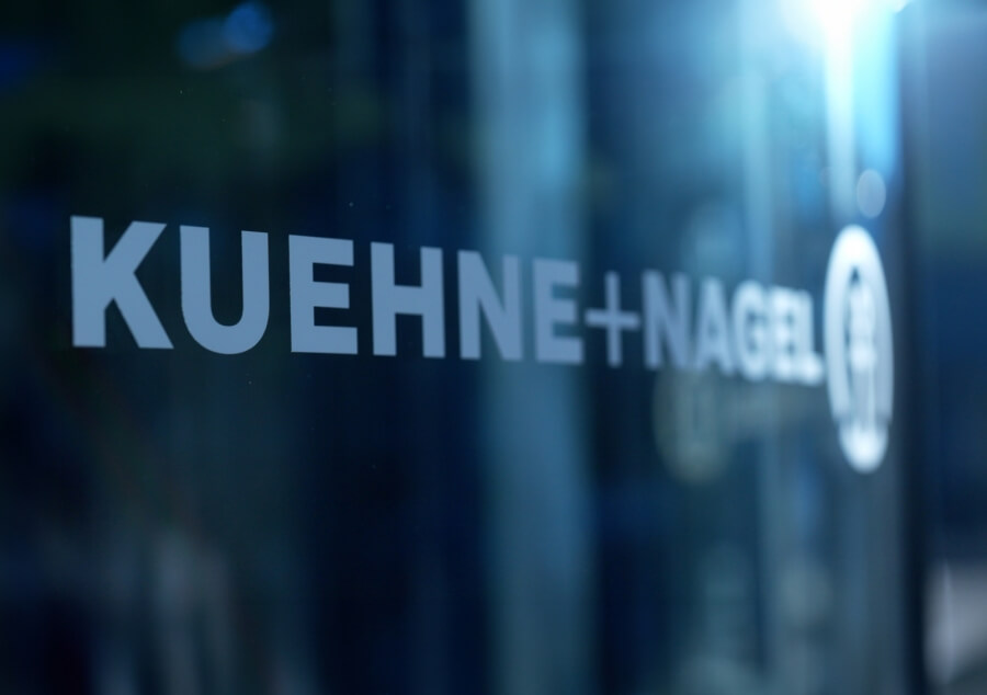 Kuehne+Nagel logo on the entry door at the headquarters in Schindellegi